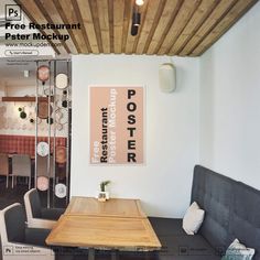 a table and chairs in a room with a wooden ceiling over the dining area that has a poster on the wall