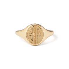 The Story Fashioned in the classic signet ring shape and style, it delivers maximum impact with its minimalist, sleek design. Our expert jeweler then hand engraves two letters of your choice in a chic Art Deco inspired open font. With its smooth all-around form, it fits the finger perfectly making it like a second skin that you never want or have to take off. Wear it as an index ring to a pinky ring, it looks great on every finger. Available to custom order in 14k yellow, white, and rose gold in Luxury Oval Signet Ring For Everyday, Classic Engraved Monogram Ring For Everyday, Classic Monogram Engraved Ring For Everyday, Everyday Luxury 14k Gold Signet Ring, Modern White Gold Oval Initial Ring, Modern Oval Engraved Ring, Classic Formal Initial Ring Tarnish Resistant, Luxury Polished Initial Open Ring, Luxury Initial Open Ring With Polished Finish