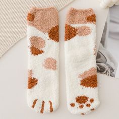 Unleash your inner feline with our Cat Paw Fuzzy Socks! Crafted for comfort and designed for fun, these socks transform your feet into cute cat paws, ensuring every step is filled with whimsy. Made with plush material, they offer unparalleled warmth and coziness, making them a must-have for those chilly days and nights. Whether you're a cat enthusiast or simply in search of unique, comfy socks, these are the purr-fect choice! Features: Material: Plush, fuzzy material for maximum warmth and comfo Aesthetic Socks, Trendy Socks, Orange Dots, Comfy Socks, Paw Design, Cat Socks, Fuzzy Socks, Cat Paw, Unique Cats