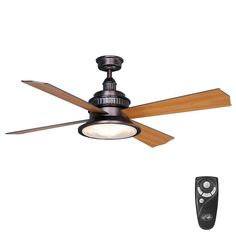 a ceiling fan and remote control on a white background