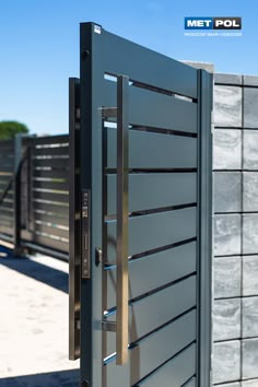 an open metal door on the side of a building