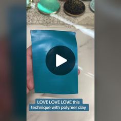 someone is holding up a video card that says love love this technique with polymer clay