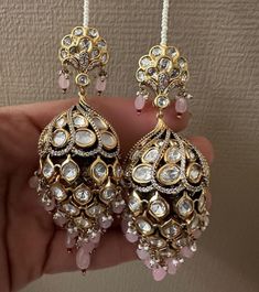 Polki kundan mint jhumki earrings with ear chain,kundan jhumki, kundan Earrings,golden polish jhumki,Bridal Earrings,Engagement Earrings Polki jhumki earrings with best quality.  Can be match with sari, suit, lehenga. Polki kundan mint jhumki earrings with ear chain,kundan jhumki, kundan Earrings,golden polish jhumki,Bridal Earrings,Engagement Earrings Kundan Temple Jewelry Earrings With Stone Work, Kundan Meenakari Temple Jewelry Bridal Earrings, Kundan Chandbali Jewelry With Tassels, Kundan Chandbali Jewelry With Latkans, Bridal Kundan Chandbali Earrings With Meenakari, Bridal Meenakari Chandbali Kundan Earrings, Kundan Earrings With Stone Work For Reception, Temple Jewelry Style Kundan Jhumkas With Intricate Design, Temple Jewelry Style Danglers With Stone Work For Reception