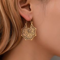 These earrings are perfect for any occasion. They are light and easy to wear, and they make a statement. These earrings are handmade and come with a beautiful mandala design. They are a great way to add some bohemian flair to your outfit. These earrings are perfect for the bohemian girl who wants to add a little something to her look. They're light and easy to wear, and they'll go with any outfit. It's a beautiful piece to adorn your look Looks great with any outfit. Lightweight, compact and dur Boho Style Earrings, Floral Pendant, Metal Earrings, Pendant Earrings, Boho Earrings, Flower Earrings, Vintage Earrings, Accessories Earrings, Vintage Silver