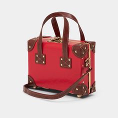 The Entrepreneur Mini | Small Red Vintage Style Crossbody Trunk Purse – Steamline Luggage Retro Shoulder Bag With Gold-tone Hardware For Travel, Gold-tone Hardware Box Shoulder Bag For Travel, Top Handle Satchel With Brass Hardware For Travel, Retro Travel Bags With Gold-tone Hardware, Rectangular Shoulder Bag With Brass Hardware For Travel, Rectangular Travel Shoulder Bag With Brass Hardware, Red Box Bag With Detachable Strap For Travel, Classic Red Box Bag For Shopping, Red Shoulder Box Bag With Gold-tone Hardware