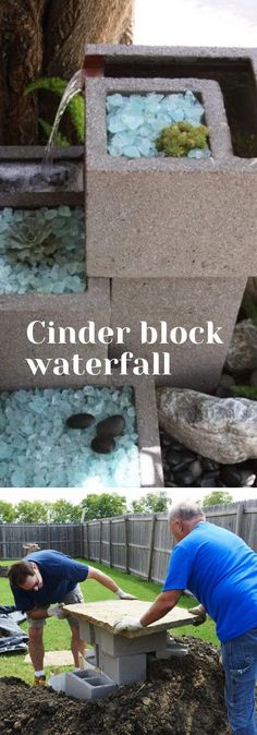 two men are working in the yard with rocks and water flowing out of their troughs