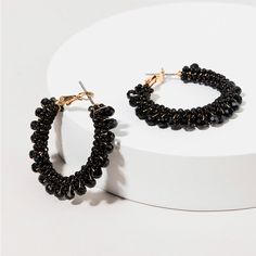 Brand New With Unopened Packaging! Beautiful Black Beaded Hoop Earrings With A Gold Base Black Metal Round Beads Earrings, Black Metal Earrings With Round Beads, Trendy Handmade Black Hoop Earrings, Trendy Handmade Black Beaded Earrings, Black Small Hoop Jewelry For Parties, Trendy Black Beaded Earrings For Gift, Black Beaded Earrings For Party, Black Beaded Party Earrings, Trendy Black Beaded Earrings