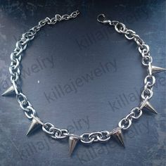 Punk/grunge style chunky spike rivet choker necklace in silver! Unisex. Chain is made from stainless steel.  Spike rivets are made of copper and measure  Available in 3 different sizes: Small ( shown in photographs) Measures 14 inches + 3 inch extension chain  Medium  Measures 16.5 inches + 3 inch extension chain  Large  Measures 19 inches + 3 inch extension chain  Small necklace comes with 6 spikes, Medium with 8 spikes and large with 10 spikes. Please don't hesitate to contact me with any quer Punk Jewelry Diy, Spike Choker, Jewelry Grunge, Punk Necklace, Choker Silver, Necklace Womens, Necklace Mens, Small Necklace, Mens Necklace