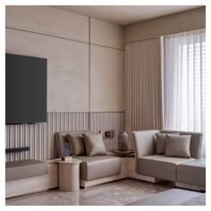 a living room filled with furniture and a flat screen tv mounted on the wall above it