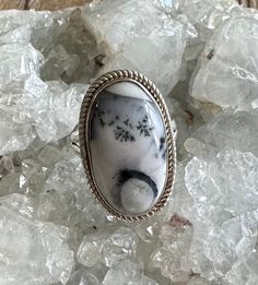 "Dendritic Opal Sterling Silver Ring Size 7 Dendritic Opal is 23x13mm Top of ring is  1-1/16\" by 5/8\" 8.1g Sterling Silver, stamped 925 *Check out my shop for one of a kind, handmade pieces that feature genuine gemstones and Sterling Silver. I love to work with unique rare gems mined in the US to support American Miners. I personally hand pick each and every single stone used in my designs. *I have been in the jewelry business for over twenty years and enjoy the process of creating pieces. I d White Oval Jewelry For Memorial, White Oval Jewelry With Natural Inclusions, Oval White Jewelry With Natural Inclusions, Oval Gemstone Ring For Memorial, White Oval Rings With Natural Stones, White Oval Ring With Natural Stones, Oval White Rings With Natural Stones, White Oval Rings With Natural Inclusions, Unique Oval Jewelry For Memorial