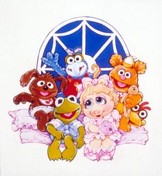 a group of stuffed animals sitting on top of a bed in front of a window