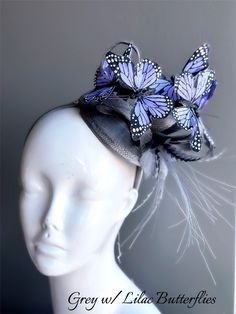 butterfly headpiece, Kentucky Derby fascinator Hat, women fascinators From our Whimsical Collection, this elegant women's fascinator Features a purple Headpiece with Blue butterflies perfect for your special event; you have the option to pick others butterfly colors and headpiece color as well! I N C L U D E D Black sinamay fascinator on headband base topped with high-quality intricately detailed butterflies. In secure box packaging to keep form. S H I P P I N G - Processed same day or within 24 Whimsical Evening Fascinator For Royal Ascot, Purple Hat As A Spring Gift, Whimsical Fascinator For Kentucky Derby Evening, Whimsical Headpieces For Royal Ascot Party, Lavender Headpiece For Kentucky Derby Evening, Whimsical Evening Fascinator For Kentucky Derby, Purple Headpieces For Spring Races, Purple Costume Hats And Headpieces For Carnival Party, Purple Hat For Spring As A Gift