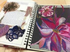 an open notebook with some art work on it and a page in the book that has been altered to look like flowers