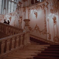 an ornately decorated staircase in a building