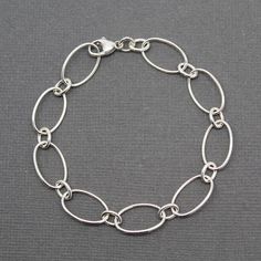 Hey, I found this really awesome Etsy listing at https://www.etsy.com/listing/483368672/oval-round-chain-bracelet-sterling Modern Sterling Silver Bracelet With Oval Link Cable Chain, Sterling Silver Cable Chain Bracelets, Silver Oval Link Chain Bracelet With Cable Detail, Silver Cable Chain Bracelet With Oval Links, Modern Sterling Silver Bracelet With Adjustable Oval Link Chain, Silver Oval Link Chain Bracelet, Silver Oval Chain Bracelet For Everyday, Sterling Silver Cable Chain Bracelet, Adjustable Oval Link Chain Bracelet