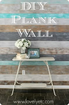 the diy plank wall is painted with white and blue paint on it's side