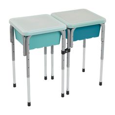 two blue and white children's tables sitting side by side on top of each other