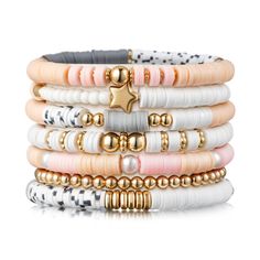 PRICES MAY VARY. Pink Stackable Bracelets: This surfer heishi clay bead bracelets set includes 7 unique bracelets, featuring 6 distinct compositions of gold-plated beads, polymer clay beads in shades of pink, gray, and white. And an additional bracelet composed of gold-plated round beads. With a dominant pink hue, these bracelets add a pop of color and style to your everyday ensemble. Great Material: Our friendship bracelets are crafted with care, strung by hand with pearl beads, 14K gold-plated Mommy And Me Clay Bead Bracelets, Clay Bead Bracelet Aesthetic, Bracelet Trends 2024, Wrist Full Of Bracelets, Ideas For Clay Bead Bracelets, Cute Clay Bead Ideas, Clay Beaded Bracelets Ideas, Pink Clay Bead Bracelet Ideas, Pink Bracelet Aesthetic