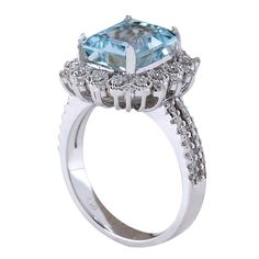 Stamped: 14K White Gold Total Ring Weight: 7.0 Grams Ring Length: N/ARing Width: N/A Gemstone Weight: Total Natural Aquamarine Weight is 3.60 Carat (Measures: 10.10x8.10 mm) Color: Blue Diamond Weight: Total Natural Diamond Weight is 0.55 Carat Quantity: 56 Color: F-G, Clarity: VS2-SI1 Face Measures: 16.95x15.30 mm Sku: [702130W] Elegant Aquamarine Ring With Vvs Clarity, Elegant Aquamarine Rings With Vvs Clarity, Luxury Light Blue Aquamarine Diamond Ring, Luxury Aquamarine Rings With Halo Setting, Luxury Aquamarine Emerald-cut Rings, 14k White Gold Diamond Ring, White Gold Diamond Rings, Natural Aquamarine, Blue Diamond