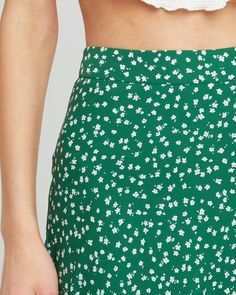 Price Comparison Few Moda $49 Alice + Olivia $440 Max Mara $125 Product Details Fun and fresh, this midi skirt is done in a sweet green print with a simple silhouette.- Back zipper- Lined- Content: 100% Polyester Style# K22WSK60008 Fit Notes - Model wearing a size S- Model measurements: Height: 5'10" Bust: 34" Waist: 24" Hips: 35" Spring Green Flowy Skirt, Spring Long Green Skirt, Green Lined Maxi Skirt For Spring, Green Long Skirt For Spring, Green Lined Skirt For Spring, Green Floral Print Knee-length Skirt, Green Midi Skirt For Summer, Green Knee-length Mini Skirt For Spring, Green Midi-length Summer Bottoms