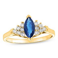 Decorate her finger with this splendid gemstone and diamond ring. Fashioned in warm 14K gold, this elegant style captivates with an 8.0 x 4.0mm marquise-cut bright blue sapphire. Triangular composites of glimmering diamonds flank each side of the center stone to complete the look. Radiant with 1/5 ct. t.w. of diamonds and a brilliant buffed luster, this ring complements her evening-ready wardrobe. Composite Ring, September Sapphire, Month Of September, Engagement Ring Inspiration, Ring Inspiration, Sapphire Solitaire, Sapphire And Diamond Ring, Sapphire Stone, Sapphire Jewelry