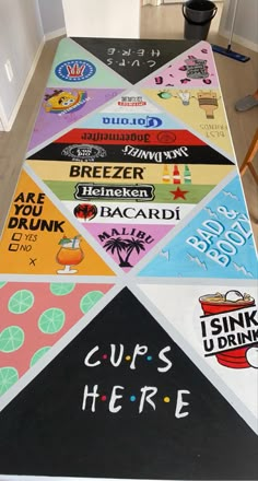 a table covered in lots of different types of stickers on top of each other