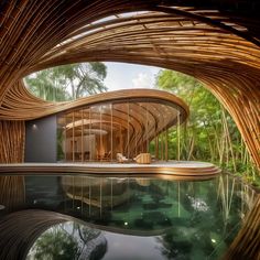 the inside of a bamboo house with a swimming pool