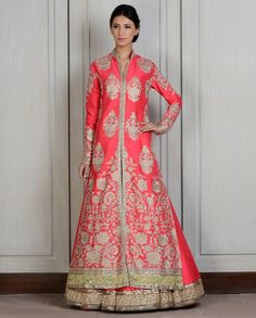 Jacket: Coral silk front open Nehru collar long jacket with Tilla embroidery motifs all over front and back. Heavy zardozi embroidered border and long side slits. Skirt: Coral silk Lehnga with thick h Reception Nehru Jacket With Resham Embroidery And Traditional Drape, Nehru Jacket With Resham Embroidery For Reception, Embroidered Straight Kurta Bandhgala For Reception, Designer Silk Nehru Jacket With Cutdana, Designer Chanderi Bandhgala With Intricate Embroidery, Designer Bandhgala With Intricate Embroidery In Chanderi, Reception Bandhgala With Zari Work, Front Open Zari Work Choli For Wedding, Anarkali Kurta With Zari Work And Front Open