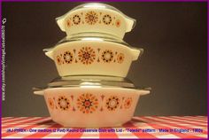 a stack of three bowls sitting on top of a checkered red and white table cloth