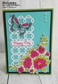 a card with flowers and a butterfly on it