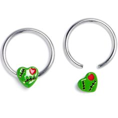 two green heart shaped nose rings with red hearts on each end and an apple in the middle