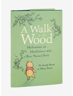 a book cover for a walk in the wood with winnie the pooh on it