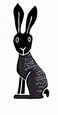 a black and white drawing of a rabbit