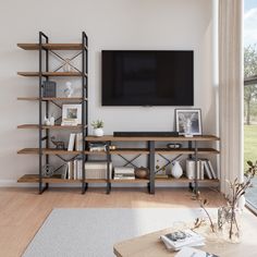 an entertainment center with bookshelves and a flat screen tv