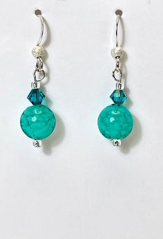 "Teal green Venetian Glass \"nuvola\" cloud earrings in beveled round shape with genuine Swarovski crystal accents. sterling french hooks. Marino Coordinating necklace available  Available in many colors These beautiful, handmade earrings are suitable for all occasions and perfect gift for women.  Great small gift to show love and friendship.  Arrives in gift box ready for giving." Hypoallergenic Glass Drop Earrings, Turquoise Glass Earrings For Gift, Glass Drop Crystal Earrings For Gift, Nickel-free Clear Round Crystal Earrings, Clear Round Crystal Earrings With Ear Wire, Round Clear Crystal Earrings With Ear Wire, Nickel-free Round Glass Jewelry, Elegant Round Glass Earrings, Hypoallergenic Czech Glass Earrings For Gift