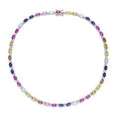 Let your vibrant personality shine through the rainbow-coloured design of this oval-shaped lab-created sapphire alternating choker necklace. Fashioned in sterling silver This choice catches the eye with an array of colorful 6.0 x 4.0mm oval-shaped lab-created sapphires. Includes: blue, orange, bright and light pink, bright and dark yellow and green Dainty round white lab-created sapphires - each artfully set to enhance size and sparkle - complete the alternating pattern. This 16.0-inch necklace secures with a spring-ring clasp. Blue Oval Faceted Necklaces, Multicolor Polished Oval Beaded Necklaces, Iridescent Oval Gemstone Necklaces, Multicolor Oval Multi-stone Necklace, Rainbow Sapphire Necklace, Vibrant Personality, Color Lab, White Lab, Peoples Jewellers