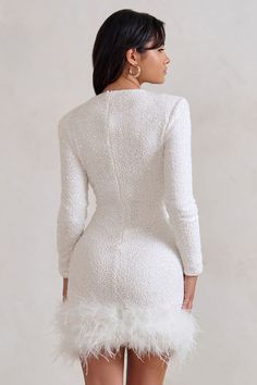 With so many sparkling sequin embellishments, our Claudia is truly a party season must-have. The little white dress features a high neckline and long sleeves with padded shoulders to exaggerate your curves. Making this mini dress all the more memorable are the feathers tickling its short hemline. Features- Premium sequin fabric- High neckline- Long sleeves- Feathered hemline- Invisible zip closure- Mini length Sizing & FitModel is 5'6" and wears UK size 8 / US size 4 Product InformationDesigned exclusively at Club L LondonPartially lined with moderate stretchPremium sequin fabric in White (100% PET, 95% Polyester, 5% Elastane)Trim: 100% real feathers85cm total lengthSKU: CL128035005 Product CareTo prolong the life of your feathers, please dry clean this product only.Please hang this style Fairy Dresses Aesthetic, Fairy Dress Aesthetic, Dress New Year, Claudia Dress, Dresses Long Sleeves, Glam Dress, Sleeves Women, Fairy Dresses, Dresses Aesthetic