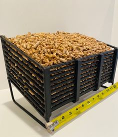 a pile of wood chips sitting on top of a scale