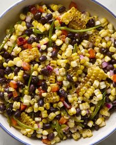 a bowl filled with corn and black beans