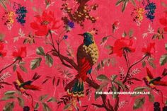 an image of a bird on a pink background with red flowers and green leaves in the foreground