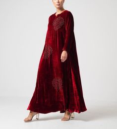 Featuring an Wine Velvet Kaftan with zardosi, cutdana, resham, sequins,dabka embroidery, floral butti & scallop motif embellishment & gota work.  For collection visit --  https://www.indberry.com This product will be shipped to you after 1-2 weeks from the date of order placed. All custom made orders are not returnable. Pls contact for Size chart and for other more colors Request You :To provide contact details for courier services. {VARIATION MAY COME ,IF ANY LACES OR GOTTA PATI or TUSSELS IS U Bollywood Style Festive Kaftan With Floral Embroidery, Festive Bollywood Kaftan With Floral Embroidery, Festive Anarkali Kaftan With Resham Embroidery, Elegant Kaftan With Floral Embroidery For Diwali, Embroidered Dress With Dori Work For Eid, Elegant Floral Embroidered Kaftan For Diwali, Festive Anarkali Embroidered Kaftan, Floral Embroidered Dress For Eid, Anarkali Embroidered Kaftan For Diwali