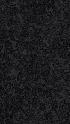 an image of a black background that looks like it has been made out of fabric