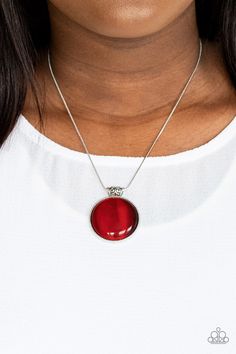 Attached to a decorative silver fitting, a dramatically oversized red cat's eye stone pendant glides along a rounded silver snake chain below the collar for a powerful pop of color. Features an adjustable clasp closure.

 Sold as one individual necklace. Includes one pair of matching earrings. Aura Red, Squirrel Jewelry, Aura Necklace, My Aura, Nickel Free Jewelry, Cats Eye Stone, Red Necklace, Silver Snake Chain, Red Cat