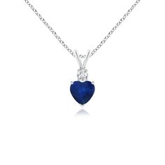 This heart-shaped sapphire pendant in 14k white gold is a beautiful symbol of love. The stunning blue gem is topped with a brilliant round diamond and linked to a rabbit ear bale. Romantic Silhouette, Blue Sapphire Jewelry, Beautiful Symbols, Solid Gold Chains, Pendant For Women, Sapphire Pendant, Rabbit Ears, Blue Gems, Symbol Of Love