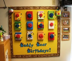 a bulletin board with magnets on it that says buddy bear birthday