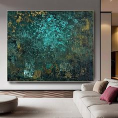 a living room with a large painting on the wall