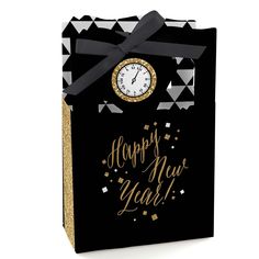 a black and gold new year's gift bag with a clock on the front