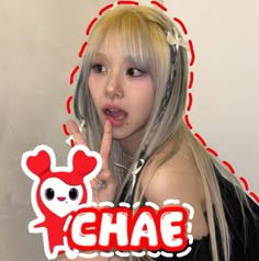 a girl with long blonde hair holding her finger up in front of her face and the word chae on it