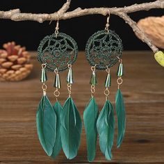 This Is A Beautiful Pair Of Dreamcatcher Earrings. They Are A Solid Green Color And Are Beautifully Detailed. Dreamcatcher Earrings, Bohemian Dreamcatcher, Shell Flowers, Princess Earrings, Feather Dream Catcher, Dream Catcher Earrings, Boho Feathers, Long Tassel Earrings, Faux Pearl Earrings