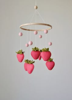 The red strawberry crib mobile is designed to entertain your baby and encourage important development skills. Also is perfect decoration for newborn nursery room, baby girl room, home decor, and baby shower gifts.  Each of my mobiles are hand made with great love, tenderness, care and attention to details - no machines involved.  The composition includes the 7 red strawberries.  Made with high quality wool felt! Toys are filled with hypoallergenic filler - holofiber. MEASUREMENTS: Diameter of th Red And Pink Nursery, Strawberry Nursery Theme, Strawberry Mobile, Strawberry Nursery, Fruit Nursery, Summer Mobile, Felt Strawberry, Summer Nursery, Fruit Baby